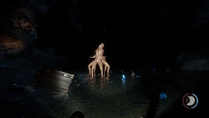 Virginia in a dark, watery cave.