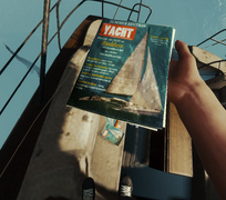 (Zoomed in) Yacht magazine in the players hand