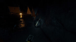 The rusty axe as found in the cave 5.