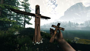 Player holding crucifix by the Cross