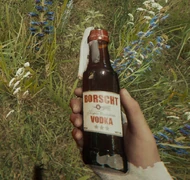 Unlit molotov in hand