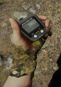 The Pedometer held by the player.