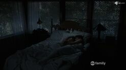 Callie and Brandon in bed together.