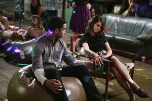 Callie holding AJ's hand at Mariana's party
