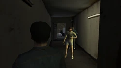 A view of the back door from inside the Yardie Drug Factory which leads to the alleyway that connects to Worship Street.