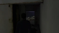 The entrance to a room where weed is being grown on the first floor of the Yardie Drug Factory.