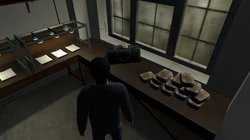 A supply of crack pouches found in the storage room ready for distribution. A bag full of them is also seen.