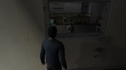 A view through a window into a second room on the second floor of the Yardie Drug Factory. This is the room Ryan and Harris are tortured in.