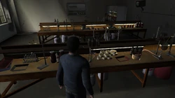 Close-up of the lab being used for making crack on the second floor of the Yardie Drug Factory.