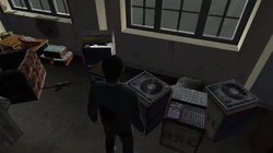 Loud speakers found in the room. If shot at and destroyed the song stops playing.