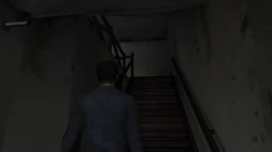 The ground floor stairwell leading to the first floor in the Yardie Drug Factory.