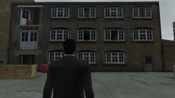 Close-up of the front of the Yardie Drug Factory.