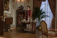One of the Russells' many footmen in the drawing room.