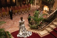 Bertha Russell walks the Great Hall stairs in Let the Tournament Begin.
