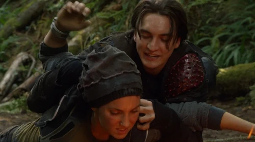 Earth Skills - Murphy removing wristbands for Bellamy