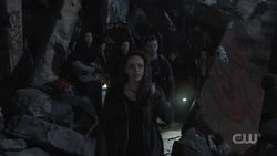 Callie leading the first Nightbloods out of the bunker.