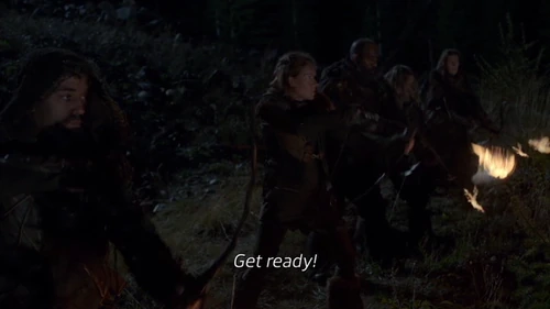 Trikru members launching a surprise attack.