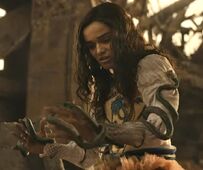 Lucy Gray snakes in arena