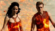 Katniss and Peeta in their chariot