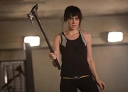 Johanna training with an axe in The Hunger Games: Catching Fire.