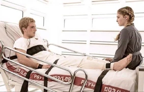 Prim talking to Peeta