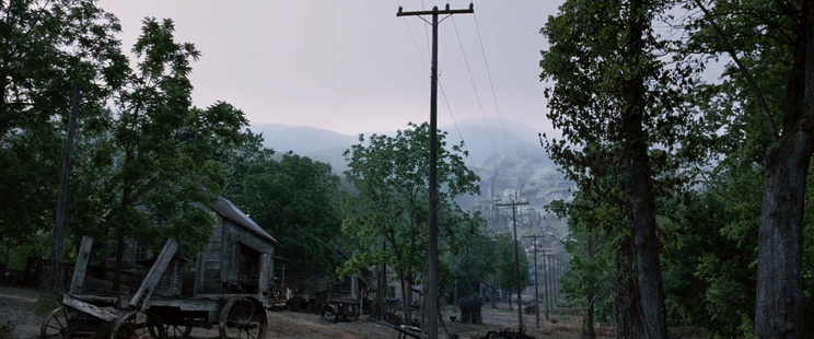 Wideshot of District 12 at dawn.