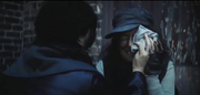 Katniss tratando el ojo de Ripper