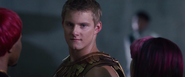 Cato glares at Katniss and Peeta after the tribute parade