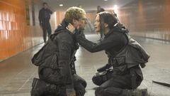 Katniss y Peeta en el Transportador