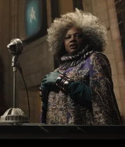 Dr. Gaul in her purple reaping outfit.