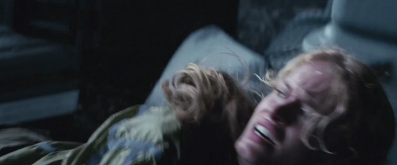 Glimmer cries for Cato after the District 6 male shoves her onto the ground.