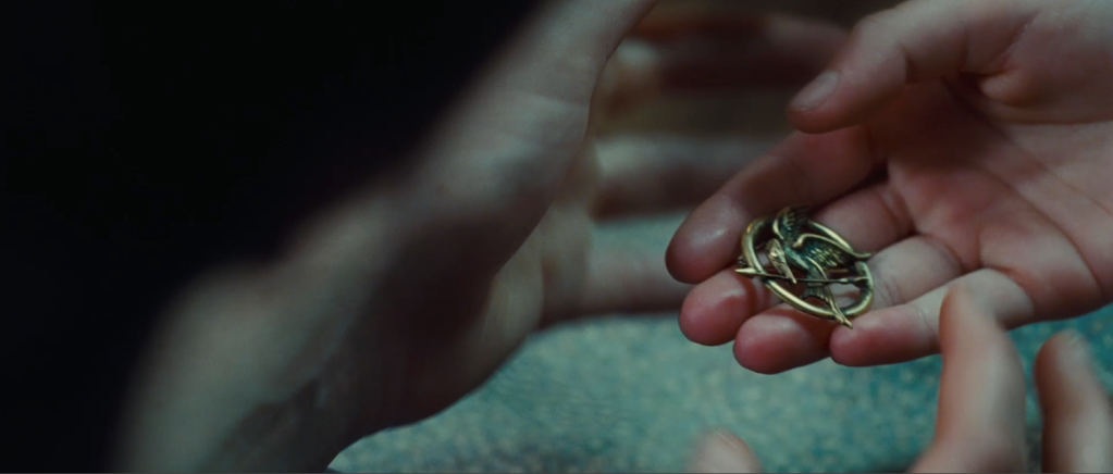 Mockingjaypin.png