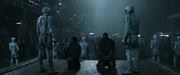 Hooded citizens of District 8 facing execution.