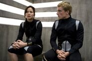 Katniss and Peeta waiting to be assessed by the Gamemakers