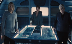 Haymitch, Finnick y Plutarch en el aerodeslizador