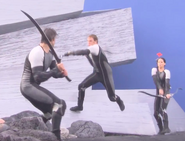 Finnick lunging at the District 9 male with a sword.