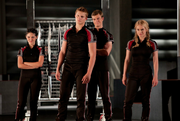 Clove, Cato, Marvel, and Glimmer in their training uniforms.