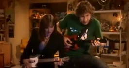 Roy and Jen playing Guitar Hero