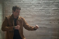 Daniel fighting someone.