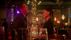 Chozen and Kim Da-Eun confronting each other at a bar.