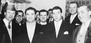 Driberg (far right) with  (far left),  (centre),  (third from right) and other Kray associates.