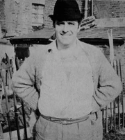 McVitie in a back garden, c