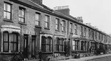 A-row-of-victorian-terraced-houses-in-an-east-london-street-due-for-demolition-mary-evans-picture-library