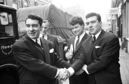 Kray Twins and Smith celebrate after being acquitted at the Old Bailey on 5th April 1965