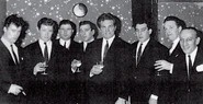 Smith (far left) with Micky Fawcett, Johnny Davis, Reggie Kray, Freddie Mills, Ronnie Kray, Dickie Morgan and Sammy Lederman at Freddie Mills’ Nite Spot.