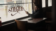 Window sign aged by HBO production crewmember