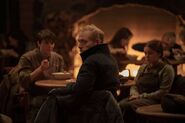 David prepares to eat with his group.