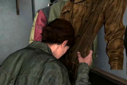 Ellie smelling Joel's jacket.