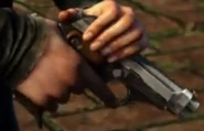 Ellie pulling back the slide on her pistol, cocking the gun.