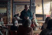 David reads the Book of Revelation to his people.
